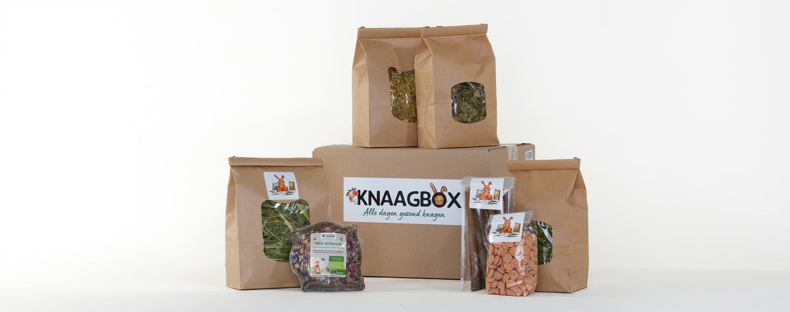 Wat zit er in onze <a href="/collections/knaagboxen" target="_blank" title="Knaagboxen">Knaagbox?</a>